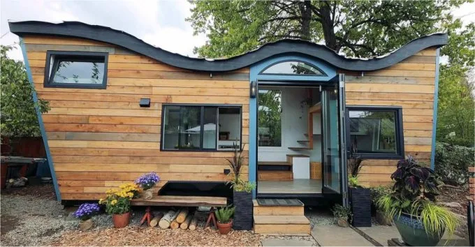 Charming Tiny House With Curved Living Roof